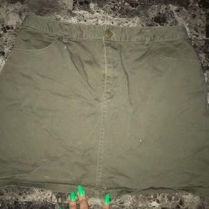 green mini skirt